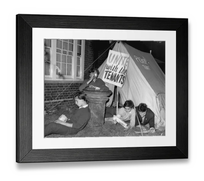 Framed Print : Lying close to their picket tent, youngsters keep a lonely vigil outside Kennistoun House Framed Print : Lying close to their picket tent, youngsters keep a lonely vigil outside Kennistoun House