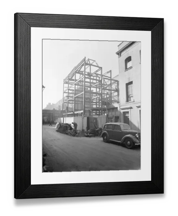 Framed Print : Scaffolding frame for the new flats on Earl Courts road, West London. 3 March 1938 Framed Print : Scaffolding frame for the new flats on Earl Courts road, West London. 3 March 1938
