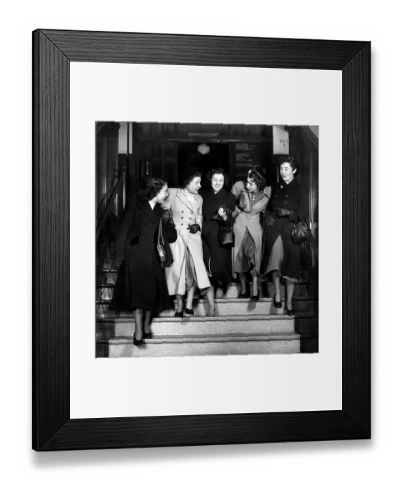 Framed Print : Female clerks, staff from Woman magazine, leaving the office, London, England Framed Print : Female clerks, staff from Woman magazine, leaving the office, London, England