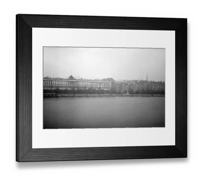Framed Print : The imposing neoclassical lines of Somerset House viewed from the south bank of the River Thames Framed Print : The imposing neoclassical lines of Somerset House viewed from the south bank of the River Thames