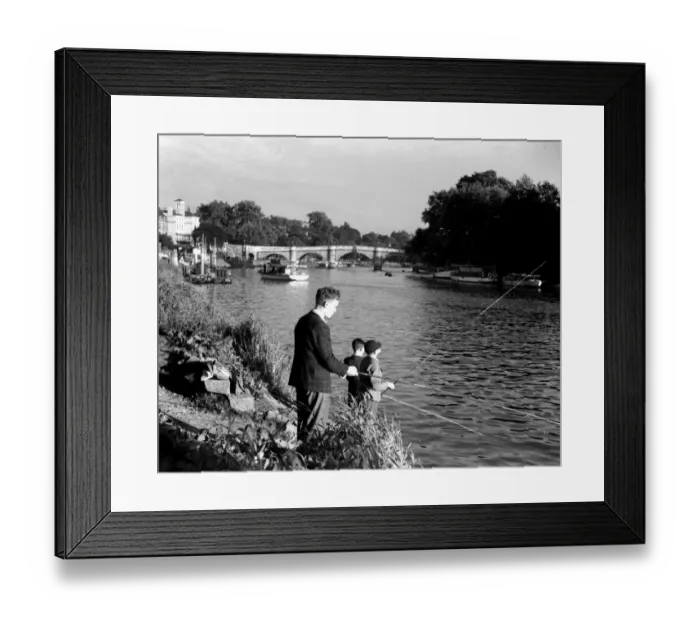 Framed Print : Boys fishing by the riverside on the Thames at Richmond, London, England, UK