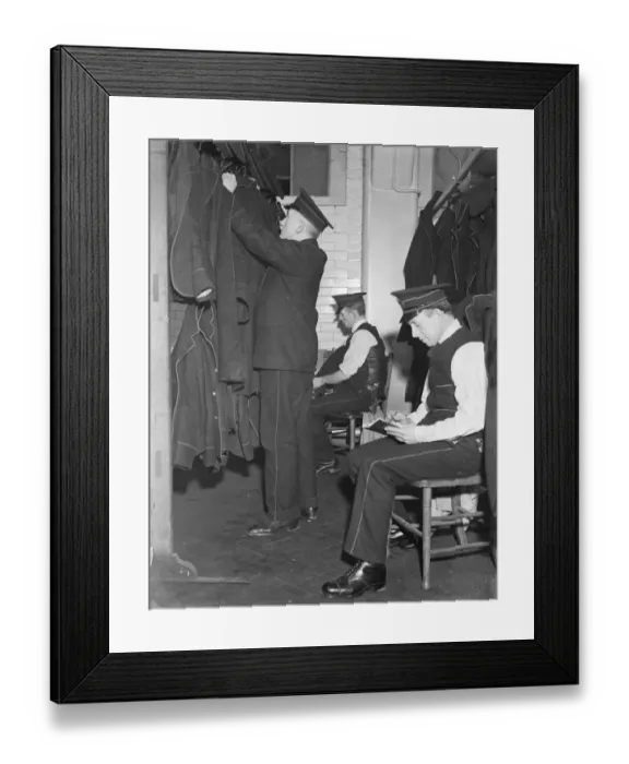 Framed Print : Postmen keep colds at bay. Dry wet clothes and special room at GPO. Specially fitted