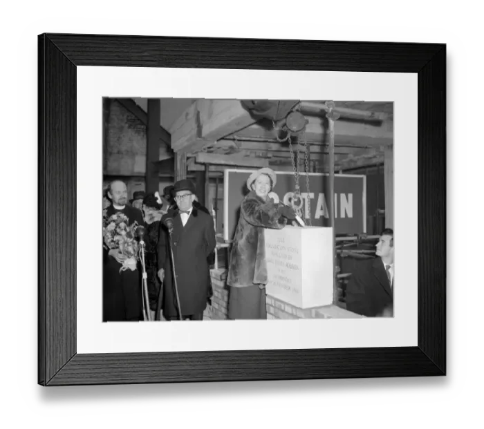 Framed Print : Dame Flora Robson with a trowel in her hand is laying the foundation stone of Framed Print : Dame Flora Robson with a trowel in her hand is laying the foundation stone of