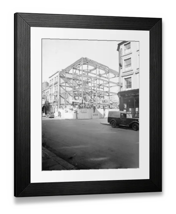 Framed Print : A scaffolding frame for construction of new flats on the Earl Court Road, West London