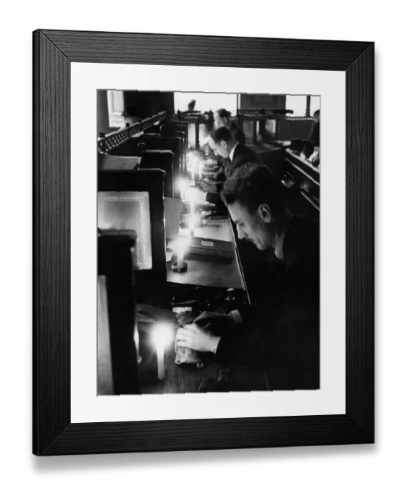 Framed Print : Bank clerks work by candlelight as Londons Electricity is Cut. Work went on by
