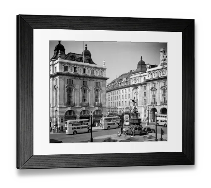 Framed Print : A view of the Swan and Edgar building and the statue of Eros in Piccadilly Circus, London Framed Print : A view of the Swan and Edgar building and the statue of Eros in Piccadilly Circus, London
