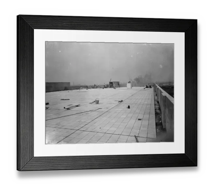 Framed Print : Workers from Val De Travers Asphalt Limited, a paving company, working on a roof in Greenwich Framed Print : Workers from Val De Travers Asphalt Limited, a paving company, working on a roof in Greenwich