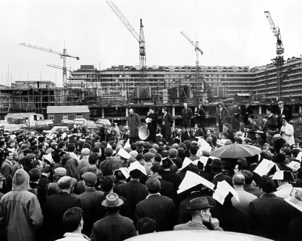 Police, armed with truncheons, clashed with strikers at the Barbican building site