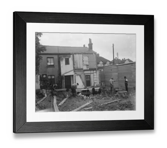 Framed Print : The Prince of Wales pub in Mottingham, Bromley is being demolished. 1936 Framed Print : The Prince of Wales pub in Mottingham, Bromley is being demolished. 1936