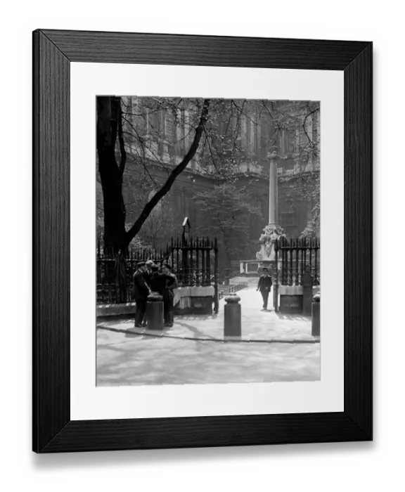 Framed Print : A group of men chat outside St Pauls Cathedral by Saint Pauls Church Yard