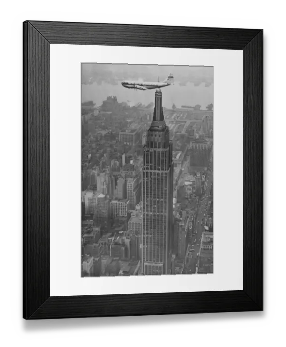 Framed Print : Flying Cloud Passes By. Passing the dirigible mooring mast 1, 250 feet above street Framed Print : Flying Cloud Passes By. Passing the dirigible mooring mast 1, 250 feet above street