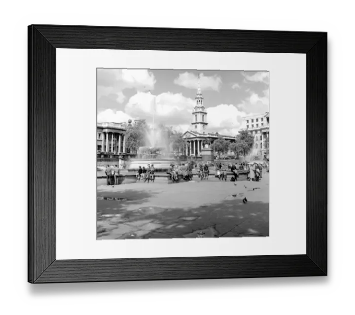 Framed Print : People around the fountains in Trafalgar Square with St. Magnus the Martyr in background Framed Print : People around the fountains in Trafalgar Square with St. Magnus the Martyr in background