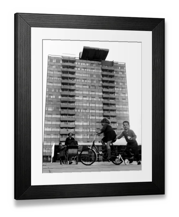 Framed Print : Children growing up in one of Londons fine blocks of council flats. Too many others Framed Print : Children growing up in one of Londons fine blocks of council flats. Too many others