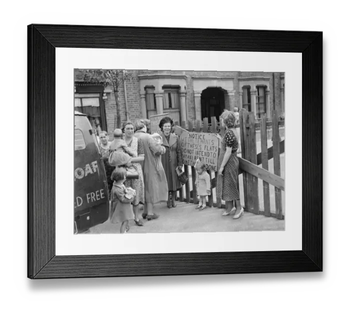 Framed Print : Residents of a street in Plumstead stage a small demonstration in reaction to how