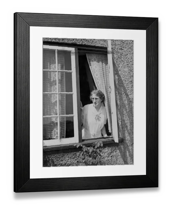 Framed Print : Watching for the bailiffs from her cottag window at Benwick, Isle of Ely, today is