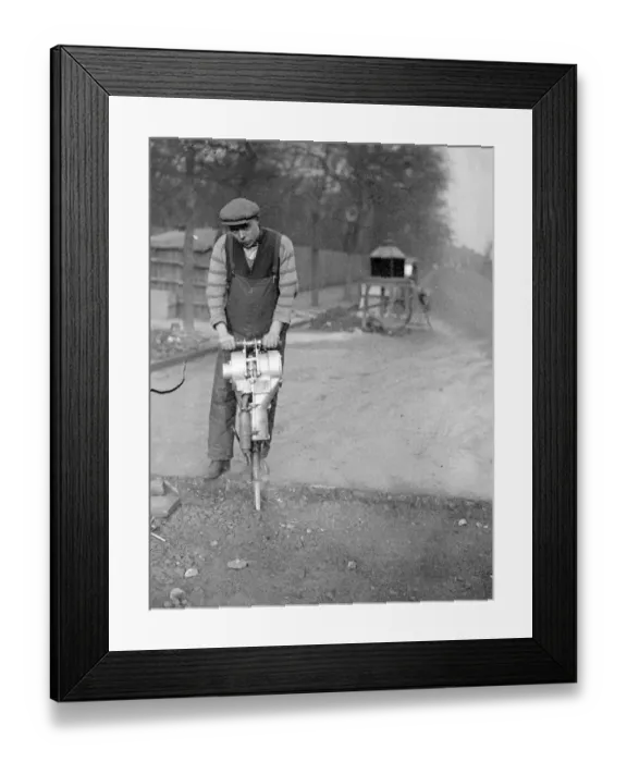 Framed Print : Road drill that is practically noiseless. Engine and drill combined. A revolutionary Framed Print : Road drill that is practically noiseless. Engine and drill combined. A revolutionary
