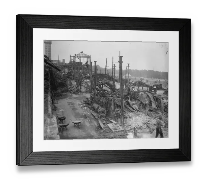 Framed Print : Sorting out the Crystal Palace remains. The twisted, flame scarred remains of