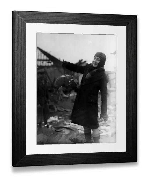 Framed Print : Home front 1940. A boy holds the world in his hand, he has just discovered Framed Print : Home front 1940. A boy holds the world in his hand, he has just discovered