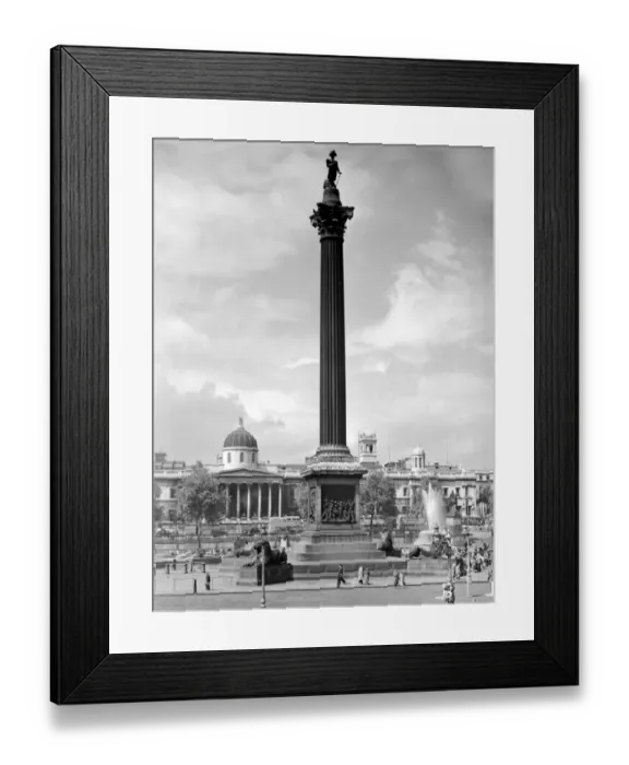 Framed Print : An iconic London landmark, Nelsons Column in Trafalgar Square with the National Framed Print : An iconic London landmark, Nelsons Column in Trafalgar Square with the National