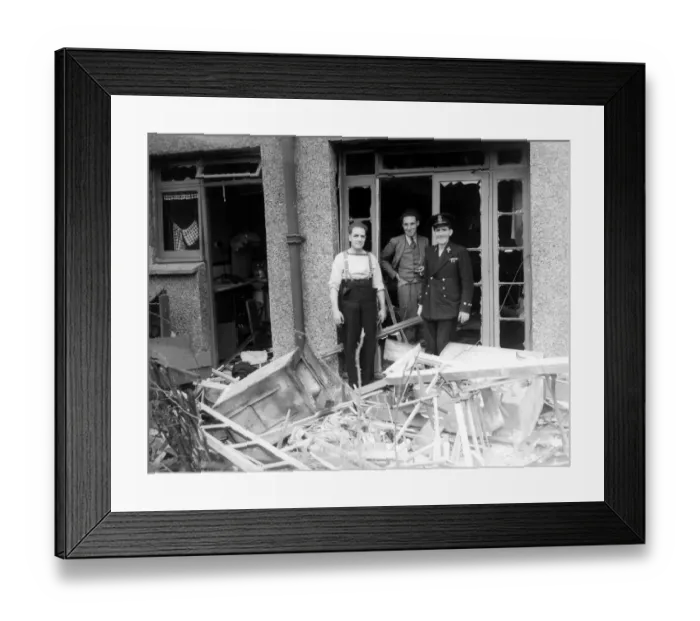 Framed Print : Home front 1940. Servicemen on leave. Find their homes damaged and surrounded by debris Framed Print : Home front 1940. Servicemen on leave. Find their homes damaged and surrounded by debris