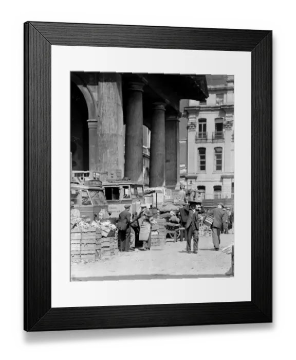 Framed Print : Market porters chatting amongst the fruit and vegetable boxes at Covent Gardens flower Framed Print : Market porters chatting amongst the fruit and vegetable boxes at Covent Gardens flower