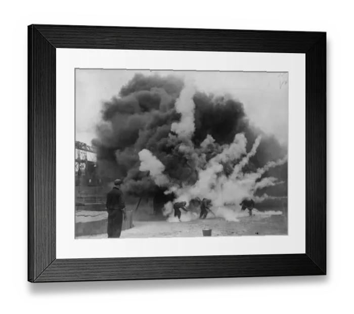 Framed Print : A bomb that puts out fires demonstrated at Clapton Stadium. A blazing building Framed Print : A bomb that puts out fires demonstrated at Clapton Stadium. A blazing building