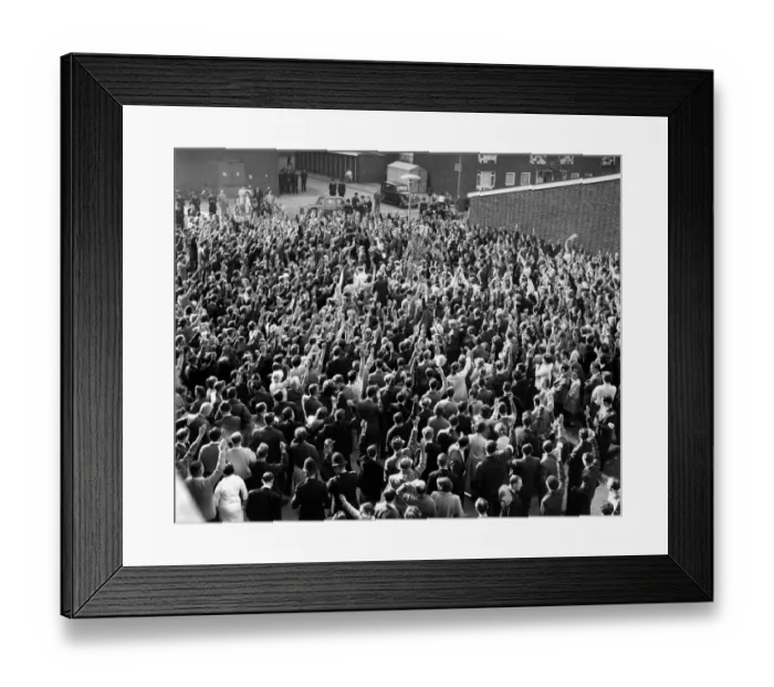 Framed Print : Hands shoot into the air to signify assent by St. Pancras tenants to the resolution