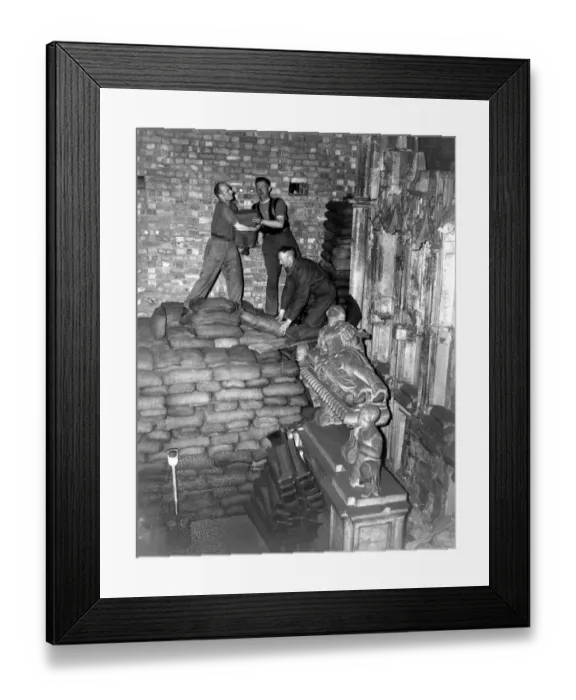 Framed Print : Work has begun on removing 80, 000 sandbags which protected precious monuments in