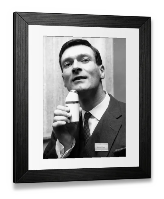 Framed Print : Elegant Shave Kenneth Grange of North London uses cordless electric shaver 22 May 1963 Framed Print : Elegant Shave Kenneth Grange of North London uses cordless electric shaver 22 May 1963