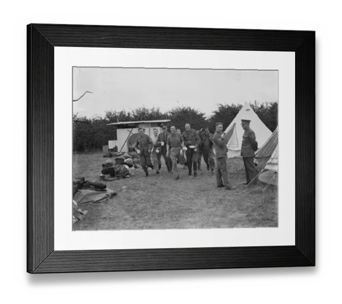 Framed Print : Territorial Army recruits at camp in Chichester, Sussex. Hurrying with cups and plates Framed Print : Territorial Army recruits at camp in Chichester, Sussex. Hurrying with cups and plates
