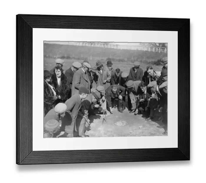 Framed Print : Marbles on village green. Old good friday custom revived. An old Good Friday custom