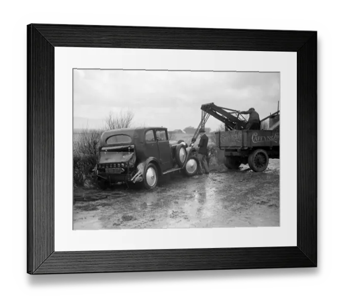 Framed Print : Road Casualties. A Breakdown car at work on a car that skidded on the icy road near Lewes Framed Print : Road Casualties. A Breakdown car at work on a car that skidded on the icy road near Lewes