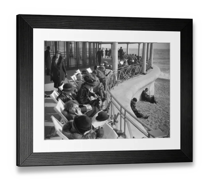 Framed Print : Spring sunshine attracts thousands to Eastbourne. Basking in the Spring sunshine Framed Print : Spring sunshine attracts thousands to Eastbourne. Basking in the Spring sunshine