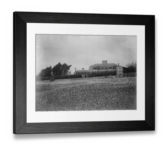 Framed Print : Craigwell House, Aldwick, Sussex. a view from the sea front showing a policeman