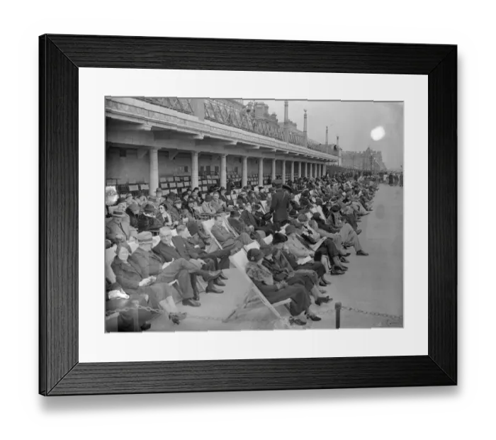 Framed Print : Spring sunshine attracts thousands to Eastbourne. Basking in the Spring sunshine Framed Print : Spring sunshine attracts thousands to Eastbourne. Basking in the Spring sunshine