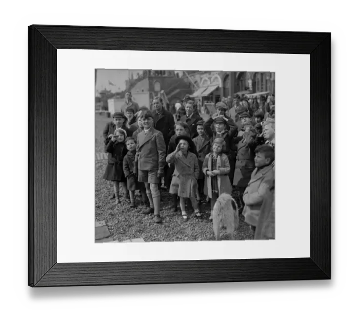 Framed Print : Punch still pleases. Intent gaze centred on a common object, this little group Framed Print : Punch still pleases. Intent gaze centred on a common object, this little group