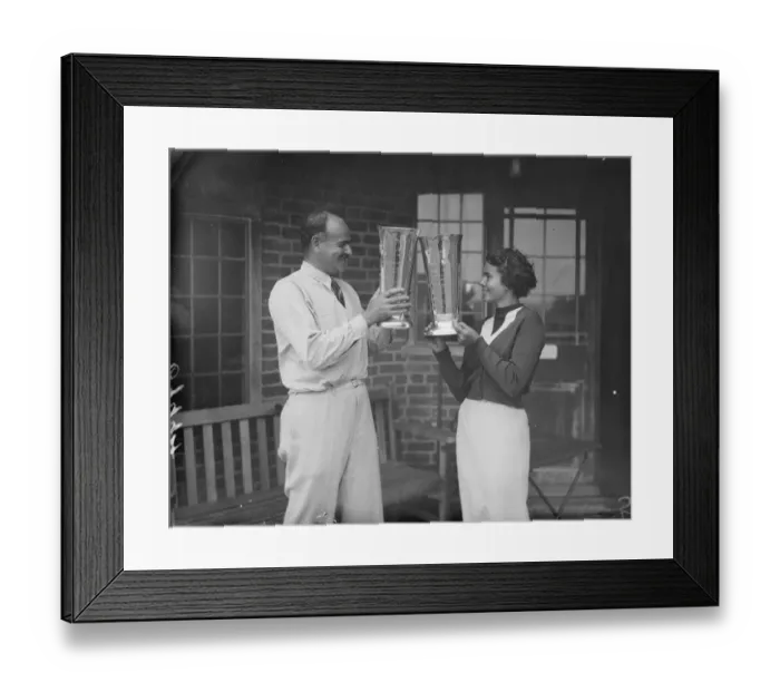 Framed Print : Monsieur A. M Vagliano and Mlle. Lally Vagliano, exchange toasts with their cup after Framed Print : Monsieur A. M Vagliano and Mlle. Lally Vagliano, exchange toasts with their cup after
