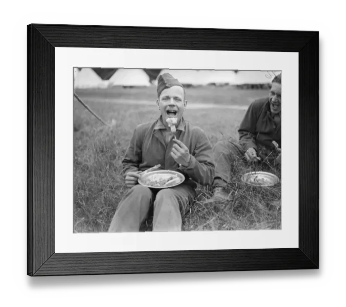 Framed Print : One of the civilian guests enjoying a meal. 15 young men from south London are spending Framed Print : One of the civilian guests enjoying a meal. 15 young men from south London are spending
