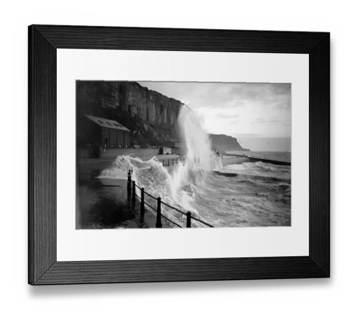 Framed Print : Rough seas at by the cliffs at Hastings, Kent. 1 February 1936 Framed Print : Rough seas at by the cliffs at Hastings, Kent. 1 February 1936