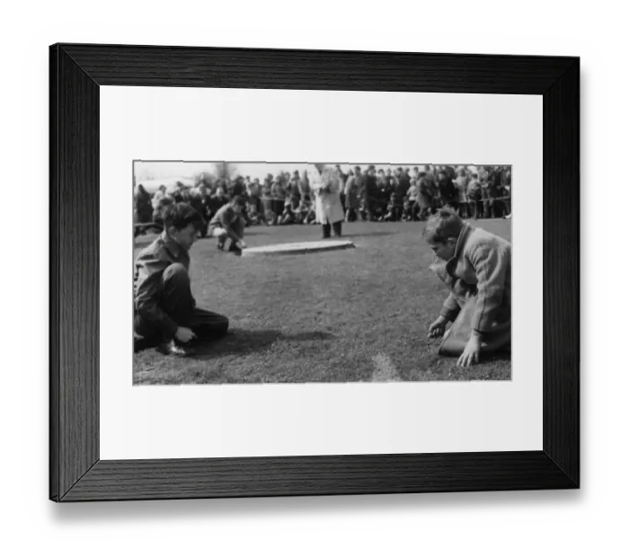 Framed Print : Tinsley Green, Sussex Two small boys engrossed in playing their own game of marbles Framed Print : Tinsley Green, Sussex Two small boys engrossed in playing their own game of marbles
