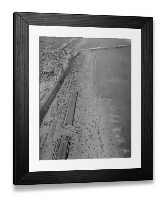 Framed Print : Brighton Beach photographed from the air today, Easter Sunday, as thousands of holidaymakers Framed Print : Brighton Beach photographed from the air today, Easter Sunday, as thousands of holidaymakers