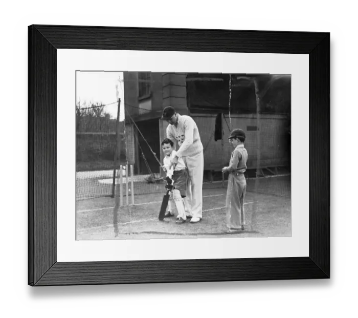 Framed Print : Young John Simon, aged 9 is no doubt thinking of the time when he ll be able to reach Framed Print : Young John Simon, aged 9 is no doubt thinking of the time when he ll be able to reach