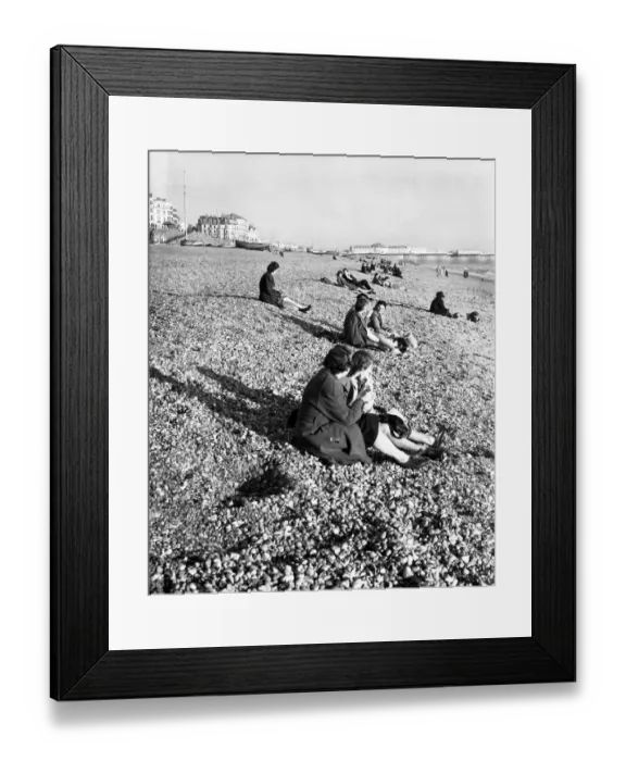 Framed Print : Brighton Enjoying the sunshine on the beach at Brighton, Sussex 5 November 1946