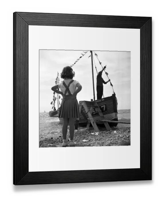 Framed Print : Brighton Little girl staring out to see looking at a tourist boat in Brighton 1950 Framed Print : Brighton Little girl staring out to see looking at a tourist boat in Brighton 1950
