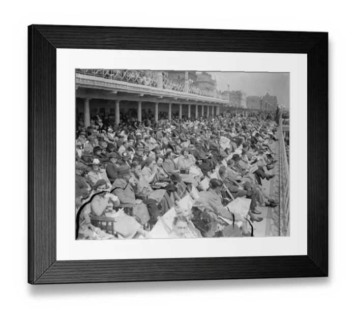 Framed Print : Holiday Crowds Find the Sun at Eastbourne Although London shivered in cold wind Framed Print : Holiday Crowds Find the Sun at Eastbourne Although London shivered in cold wind