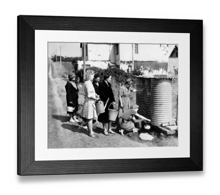 Framed Print : In Roderick Avenue Peacehaven Sussex these tanks filled twice daily with drinking water Framed Print : In Roderick Avenue Peacehaven Sussex these tanks filled twice daily with drinking water