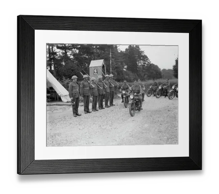 Framed Print : Territorial Army recruits at camp in Chichester, Sussex. Motorcyclists ride past Framed Print : Territorial Army recruits at camp in Chichester, Sussex. Motorcyclists ride past