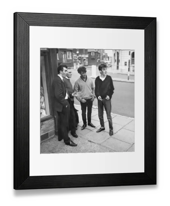 Framed Print : 1962 Men standing on a street corner in East Grinstead, West Sussex watching girls go by Framed Print : 1962 Men standing on a street corner in East Grinstead, West Sussex watching girls go by