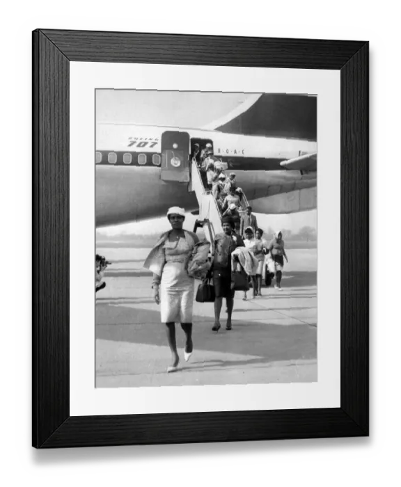 Framed Print : Chartered Boeing 707 jet airliners are flying in hundreds of coloured immigrants Framed Print : Chartered Boeing 707 jet airliners are flying in hundreds of coloured immigrants