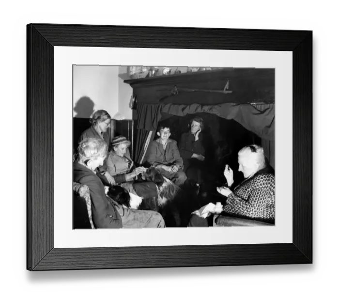Framed Print : A group of elderly people and their dogs gathered together in a house in Sussex, England Framed Print : A group of elderly people and their dogs gathered together in a house in Sussex, England